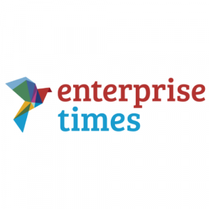 The image shows the logo of Enterprise Times with a multicolored, geometric bird design to the left of the text. The word enterprise is in red and times in blue, all lowercase.
