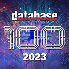 Digital artwork showing Database Trends and Applications with 100 stylized in a circuit design. 2023 is below on a colorful, abstract background resembling a digital circuit board.